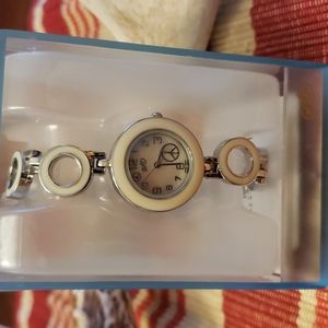 So silver-cream watch with ☮ sign